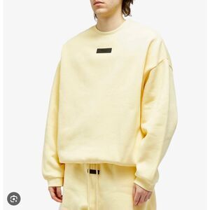 Men Fear of God ESSENTIALS Spring Tab Detail Sweatshirt in Garden Yellow Medium